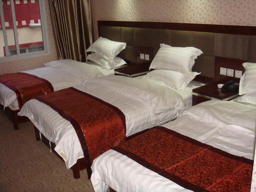 Jiuzhaigou Man Jiang Hong Hotel Habitación foto